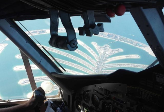 She often posts photos of the view from the cockpit like this one over dubai.jpg