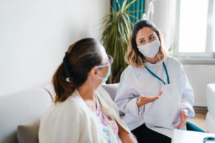 Caregiver at home visit during Lockdown